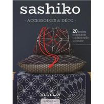 Couverture du livre Sashiko – Accessoires & déco de Jill Clay, présentant des créations textiles brodées en sashiko, art japonais de broderie aux motifs géométriques traditionnels.
